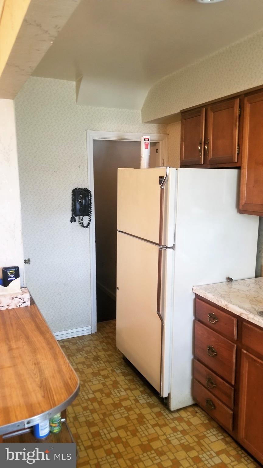 6909 Broening Road Baltimore, MD 21222 - Photo 9 of 13 Kitchen door to lower level