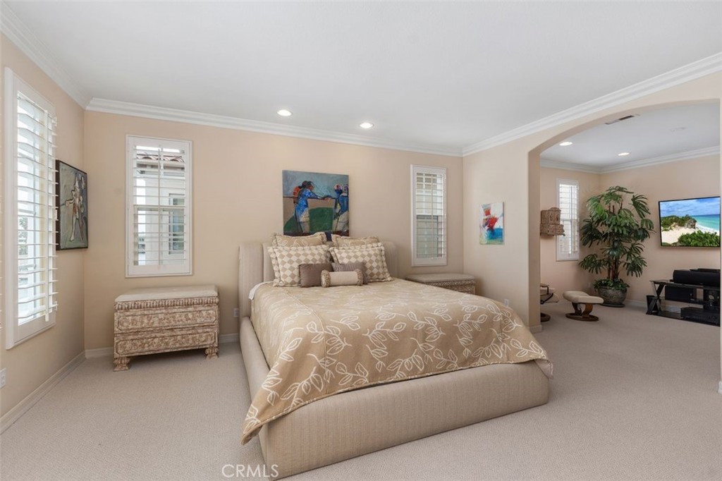 354 Salta Verde Point Long Beach, CA 90803 - Photo 14 of 33 a bedroom with a bed a couch and dresser