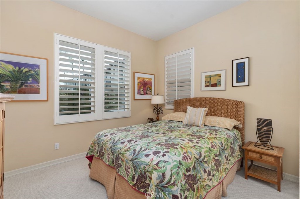 354 Salta Verde Point Long Beach, CA 90803 - Photo 21 of 33 a bedroom with a bed and a window