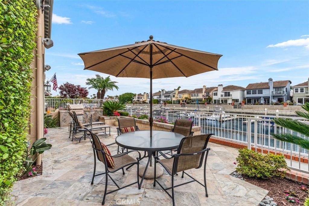 354 Salta Verde Point Long Beach, CA 90803 - Photo 23 of 33 a view of a terrace with furniture and umbrella