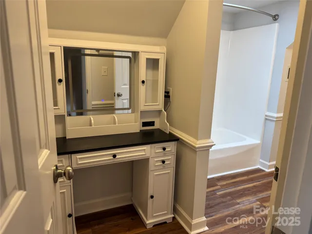 a bathroom with a sink and washing machine