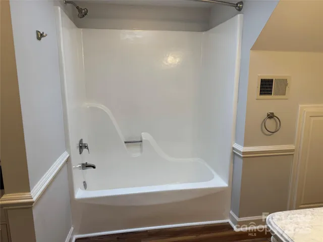 a view of a hallway view with staircase