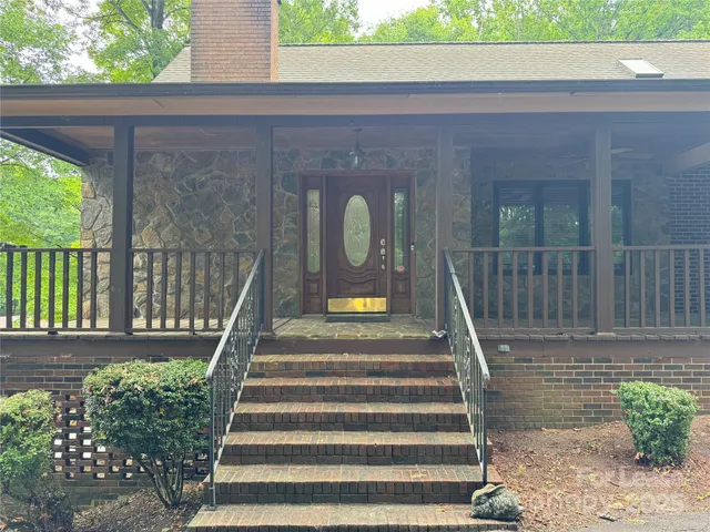 a view of stairs with a garden
