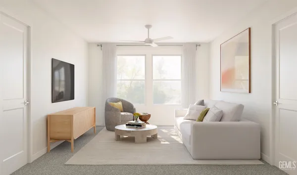 a living room with furniture and a window