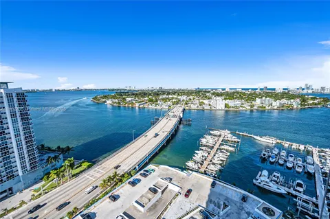 a view of a city with tall buildings