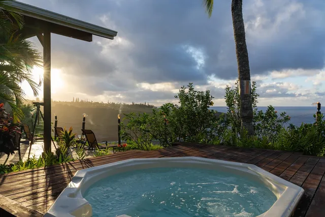 a view of a swimming pool with a yard