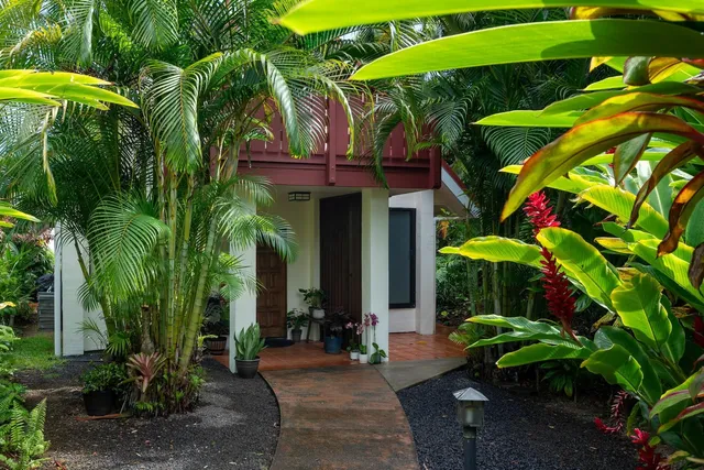 a view of a hallway with seating area