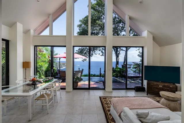 a view of an outdoor sitting area with brick wall