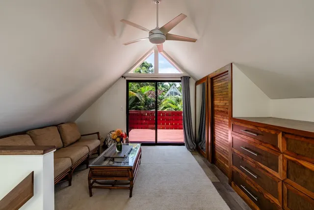 a bathroom with a granite countertop sink a mirror and a shower