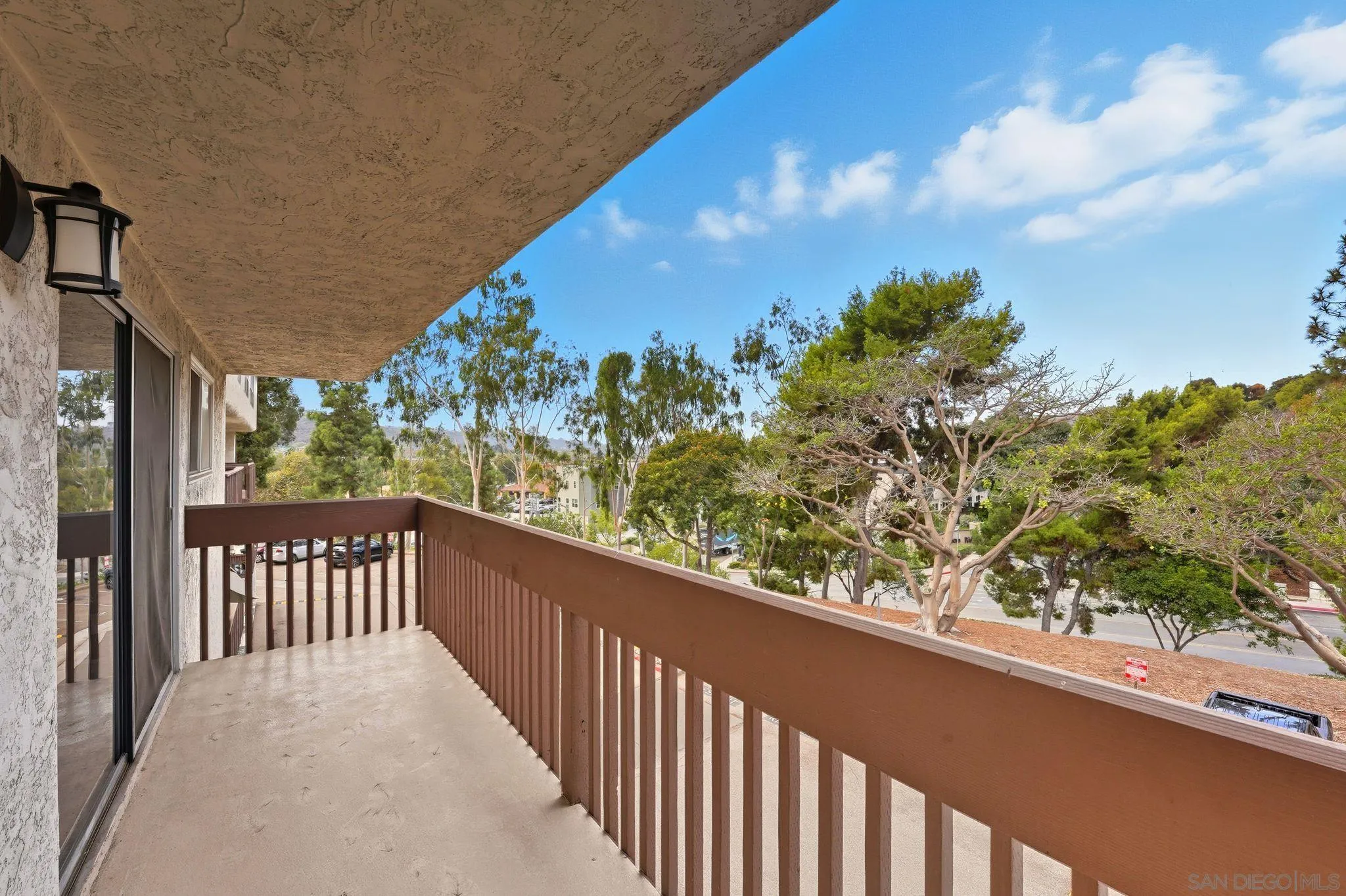 6111 Rancho Mission Road, Unit 209 San Diego, CA 92108 - Photo 18 of 20 a view of a balcony with an outdoor space