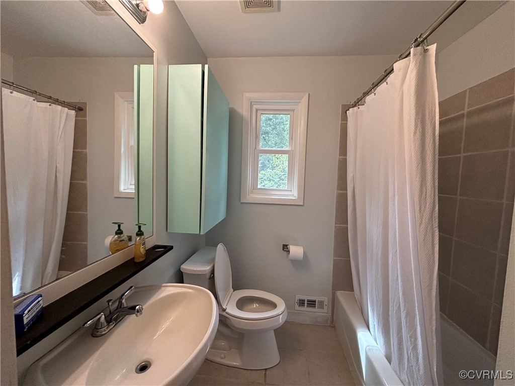 7414 Biscayne Road Henrico, VA 23294 - Photo 12 of 18 Full bathroom with sink, toilet, shower / tub comb