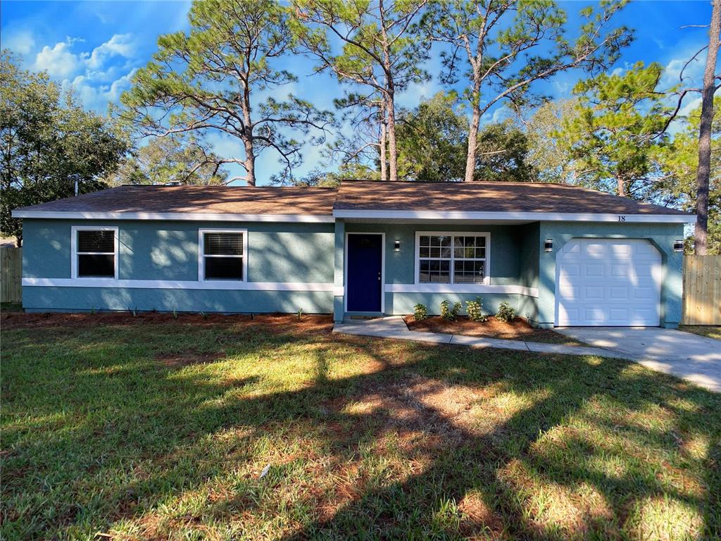18 Midway Court Ocala, FL 34472 - Photo 14 of 38 a view of house with outdoor space and swimming pool