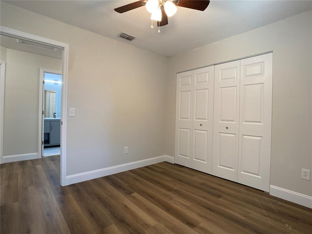 18 Midway Court Ocala, FL 34472 - Photo 38 of 38 a view of an empty room with wooden floor