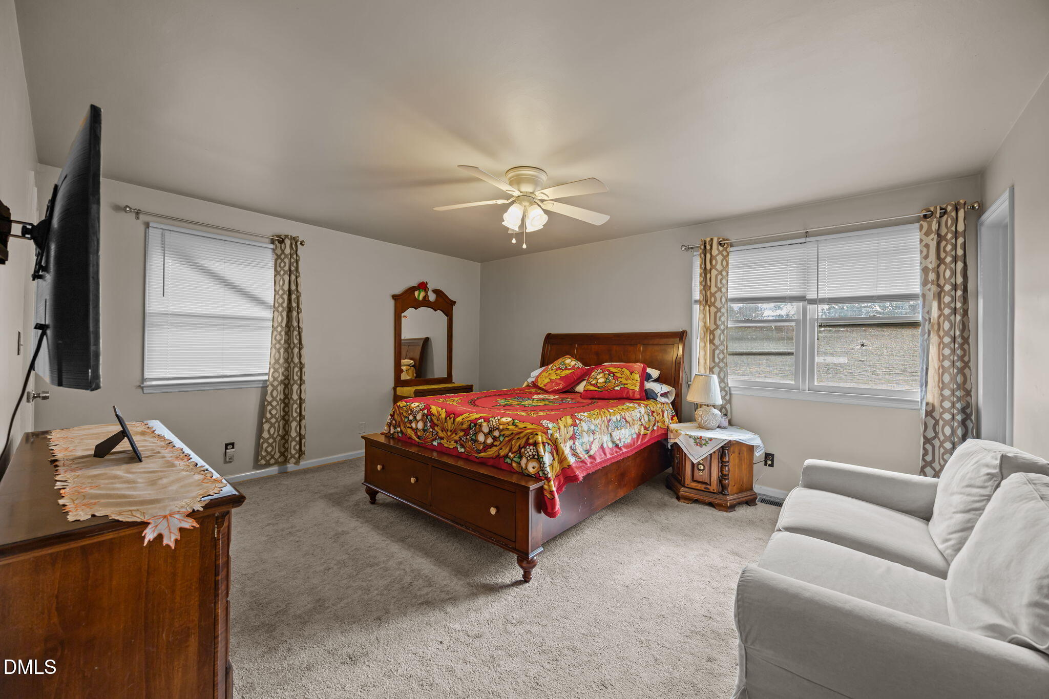 3256 North Old Franklin Road Spring Hope, NC 27882 - Photo 11 of 27 a bedroom with a bed and window