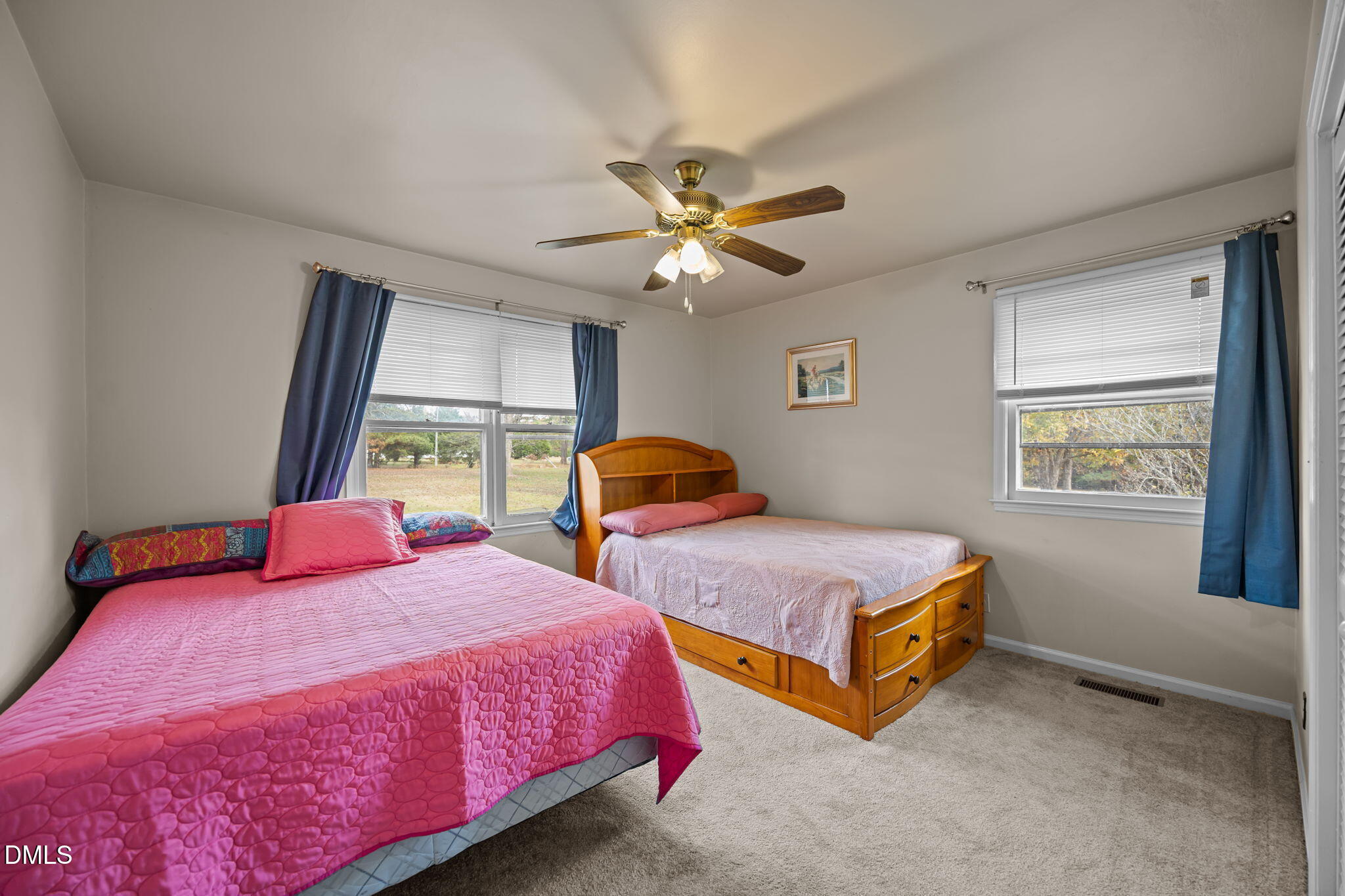 3256 North Old Franklin Road Spring Hope, NC 27882 - Photo 12 of 27 a bedroom with two beds and a window