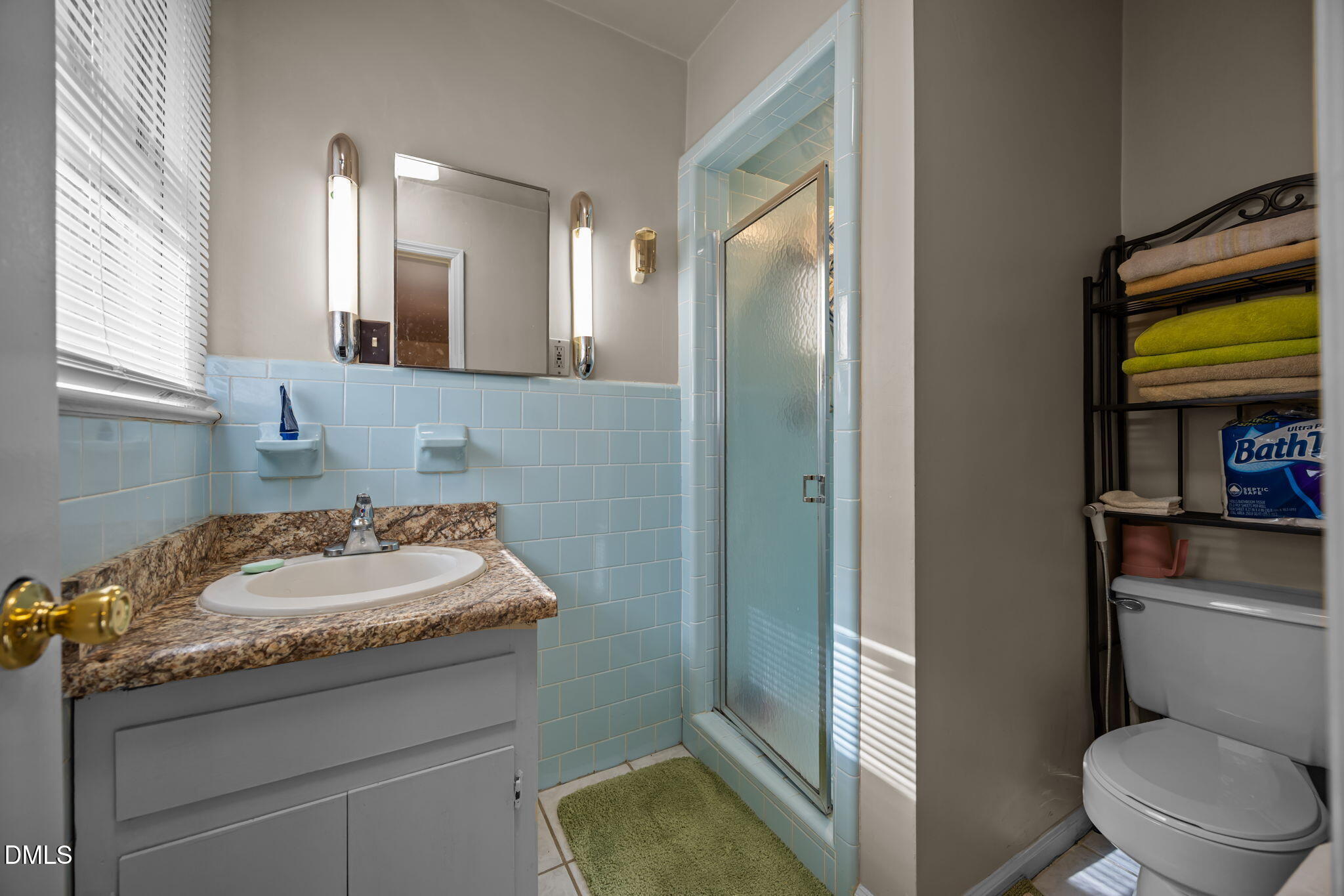 3256 North Old Franklin Road Spring Hope, NC 27882 - Photo 14 of 27 a bathroom with a granite countertop sink toilet and shower