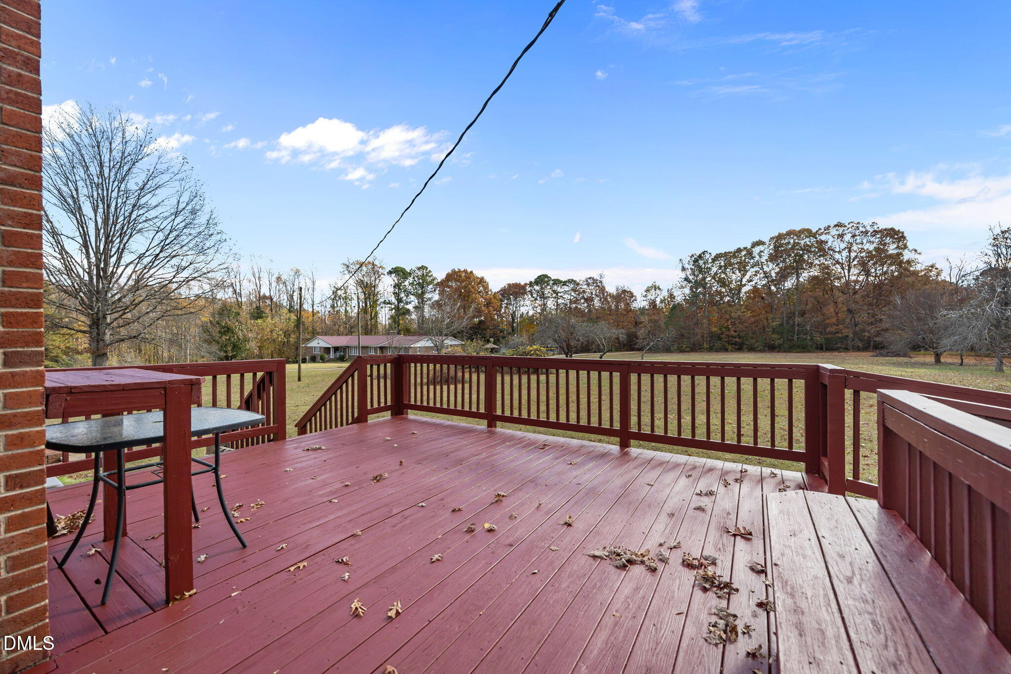 3256 North Old Franklin Road Spring Hope, NC 27882 - Photo 20 of 27 a view of balcony with wooden floor and outdoor seating