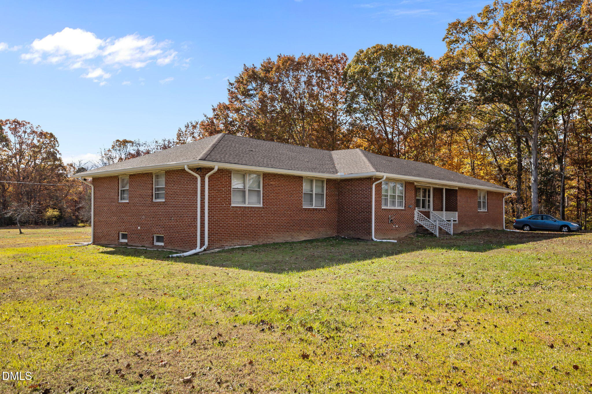 3256 North Old Franklin Road Spring Hope, NC 27882 - Photo 21 of 27 a view of a yard in front of a house with a large tree