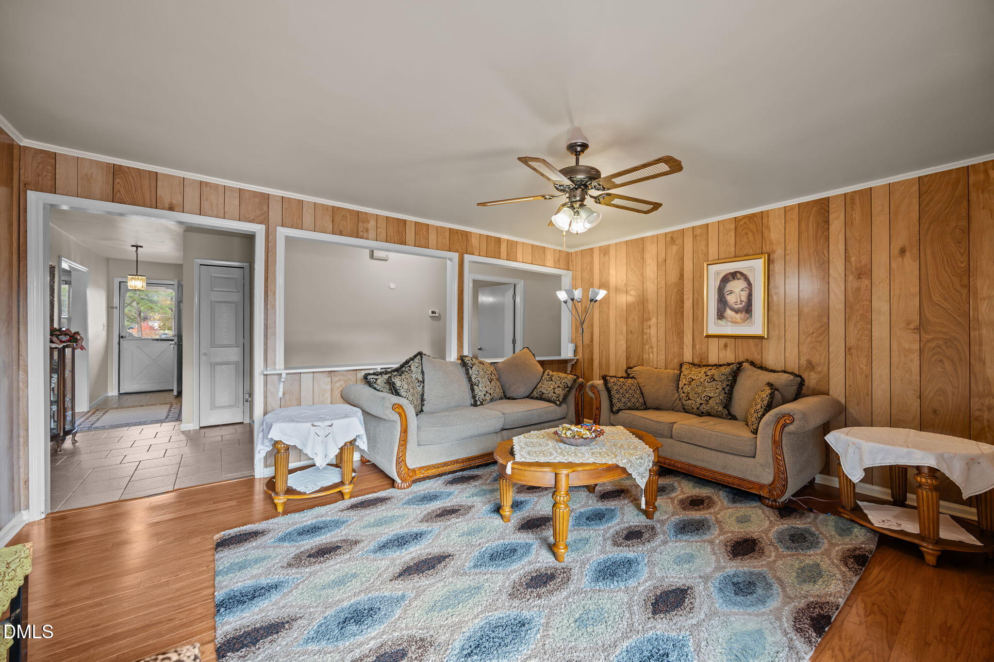 3256 North Old Franklin Road Spring Hope, NC 27882 - Photo 3 of 27 a living room with furniture and a large window