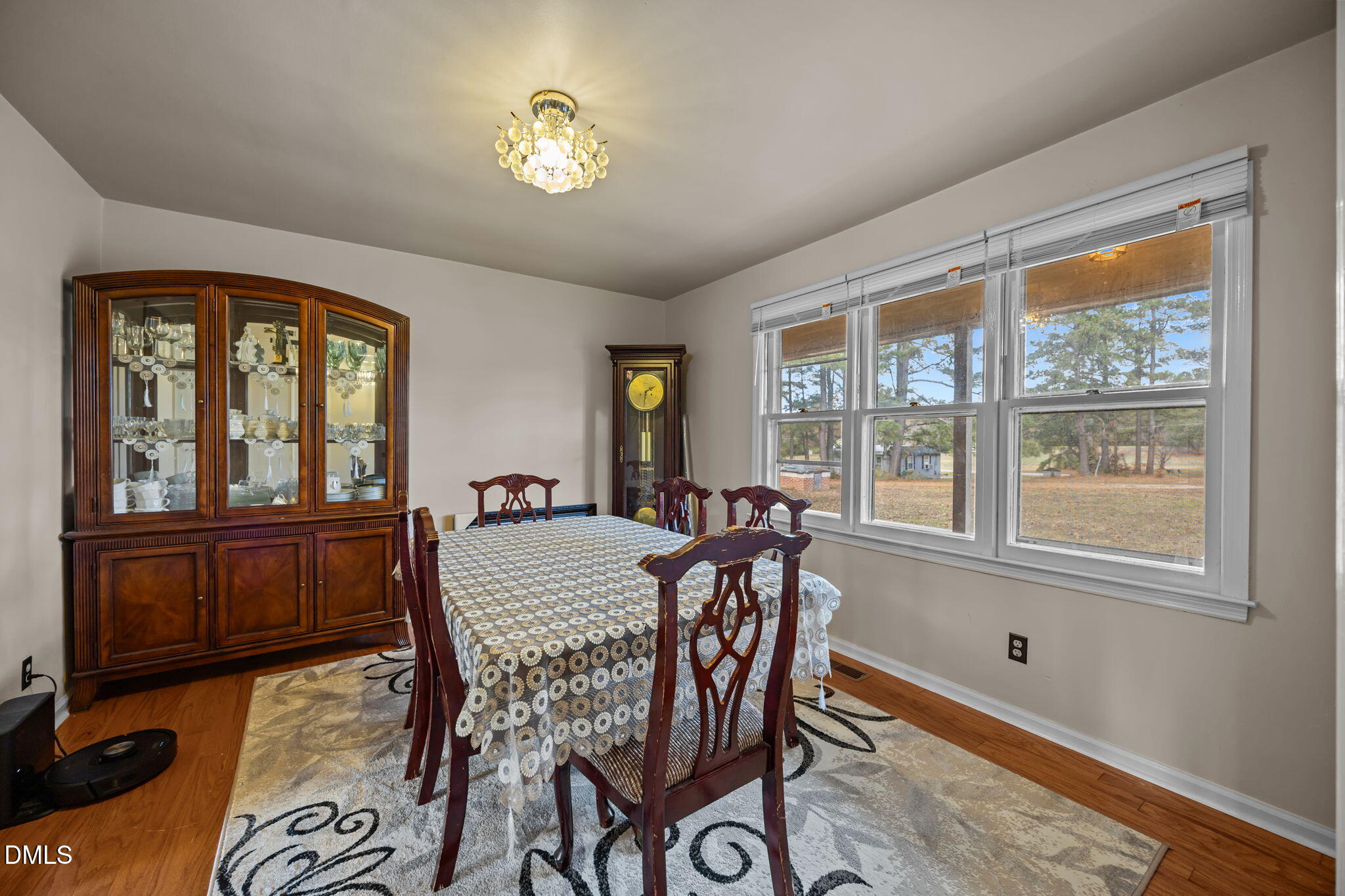 3256 North Old Franklin Road Spring Hope, NC 27882 - Photo 4 of 27 a view of a dining room with furniture window and outside view