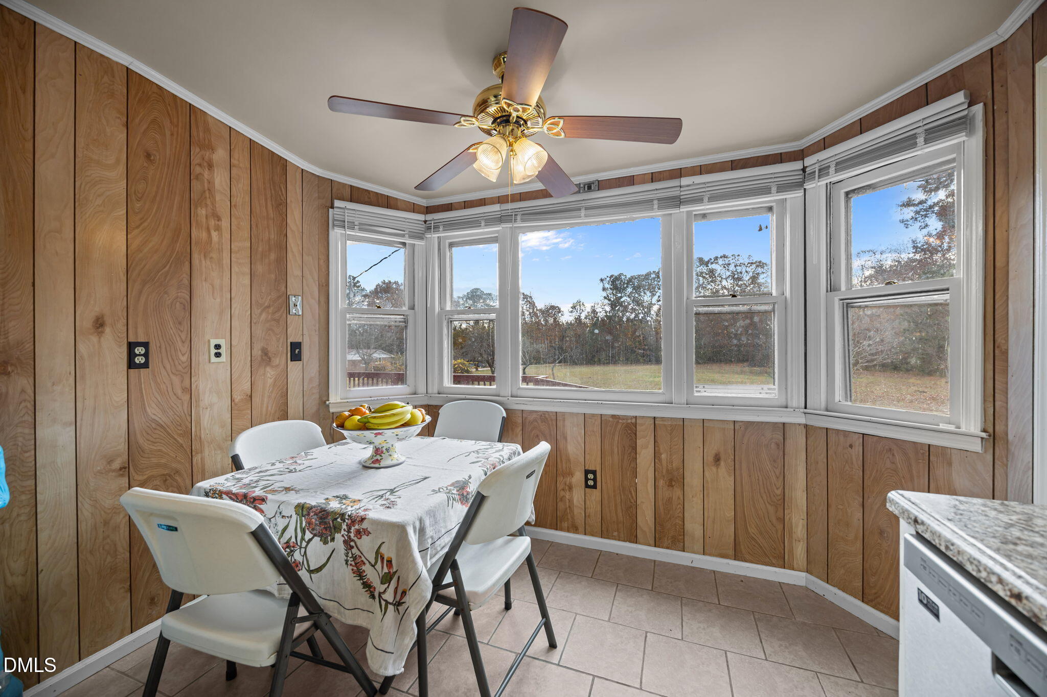 3256 North Old Franklin Road Spring Hope, NC 27882 - Photo 6 of 27 a view of a dining room with furniture window and outside view