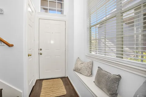a view of a bedroom with window