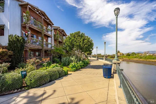 a front view of a building with garden
