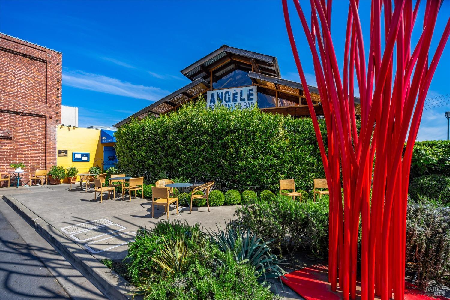 1777 McKinley Road Napa, CA 94558 - Photo 18 of 23 a view of a tall building with a bench in front of building