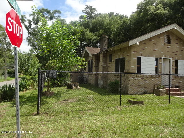 2829 Fleming Street Jacksonville, FL 32254 - Photo 2 of 11 a front view of a house with a yard