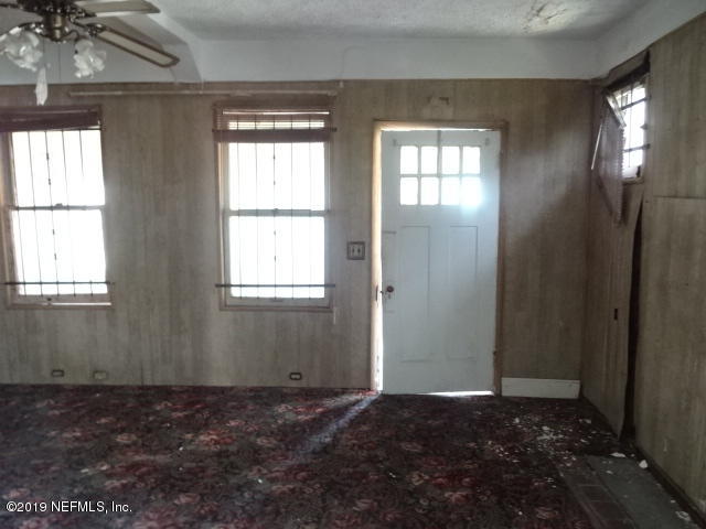 2829 Fleming Street Jacksonville, FL 32254 - Photo 7 of 11 an empty room that has a window