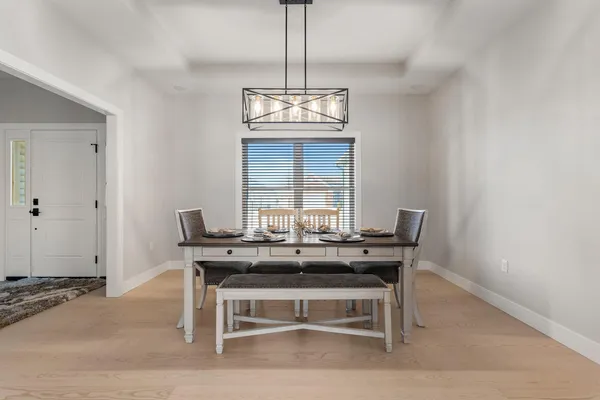 a view of a workspace with furniture