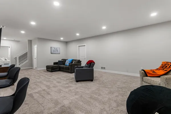 a living room with furniture and a couch