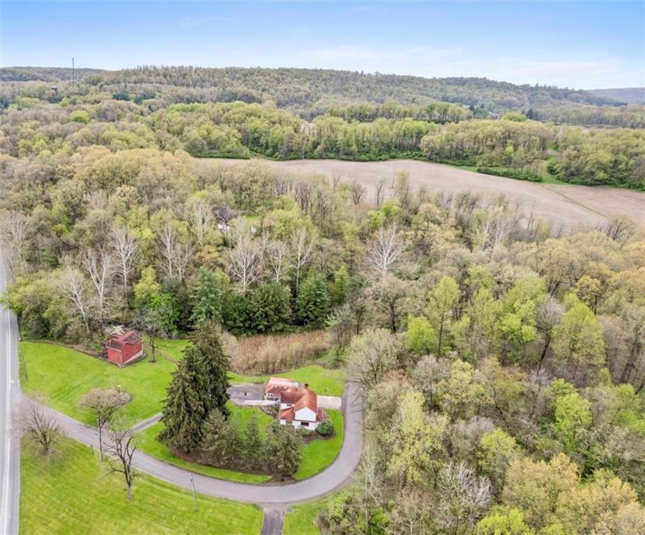 6438 Wampum Mt Air Road Wampum, PA 16157 - Photo 6 of 42 an aerial view of a house with a yard