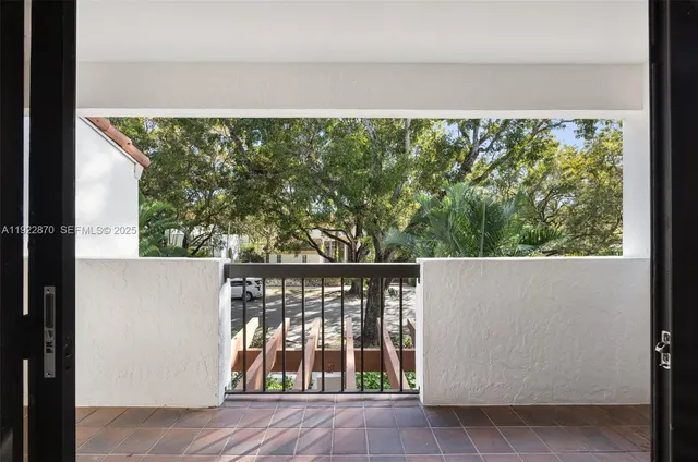 a view of a balcony with an outdoor space