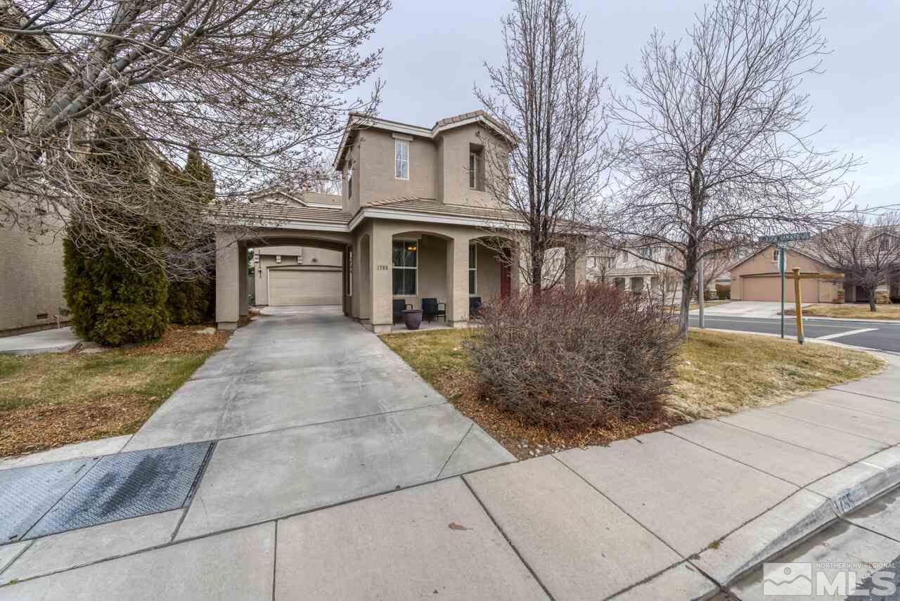 1795 Back Country Road Reno, NV 89521 - Photo 1 of 21 a front view of a house with garden