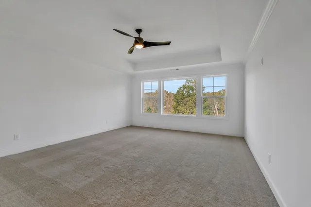 a view of a balcony with wooden floor