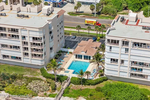 a aerial view of a multi story residential apartment building