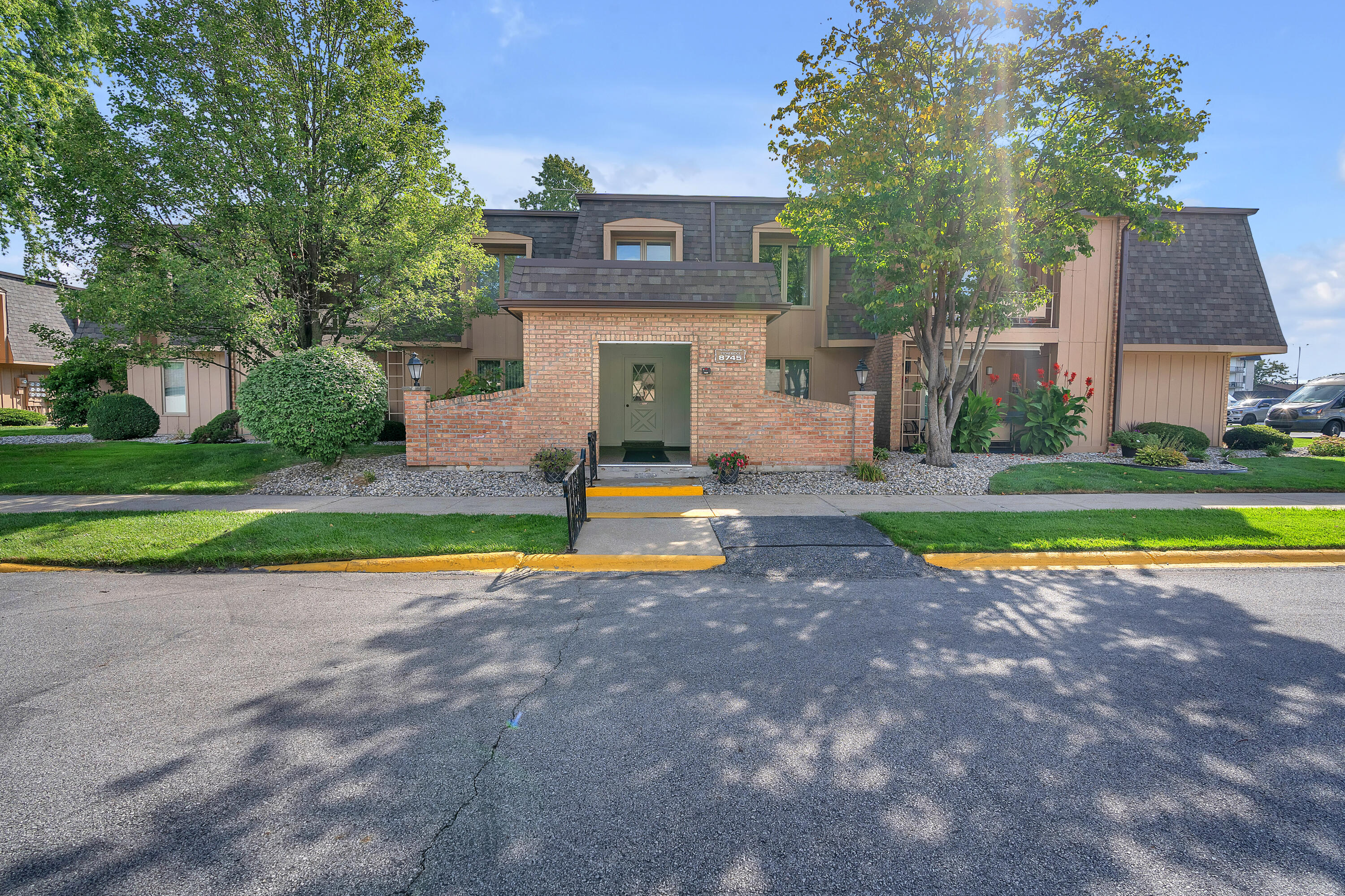 8745 Janeway Court, Unit J3 Munster, IN 46321 - Photo 23 of 23 a view of outdoor space yard and swimming pool