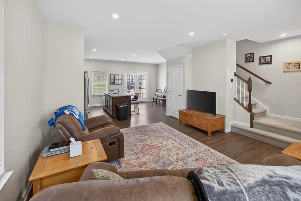 a bedroom with furniture and a fireplace