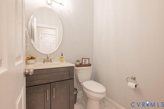 9425 Marie Road New Kent, VA 23124 - Photo 31 of 55 a bathroom with a sink and a mirror