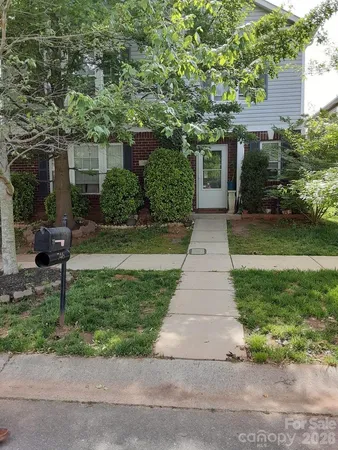 front view of a house and a yard