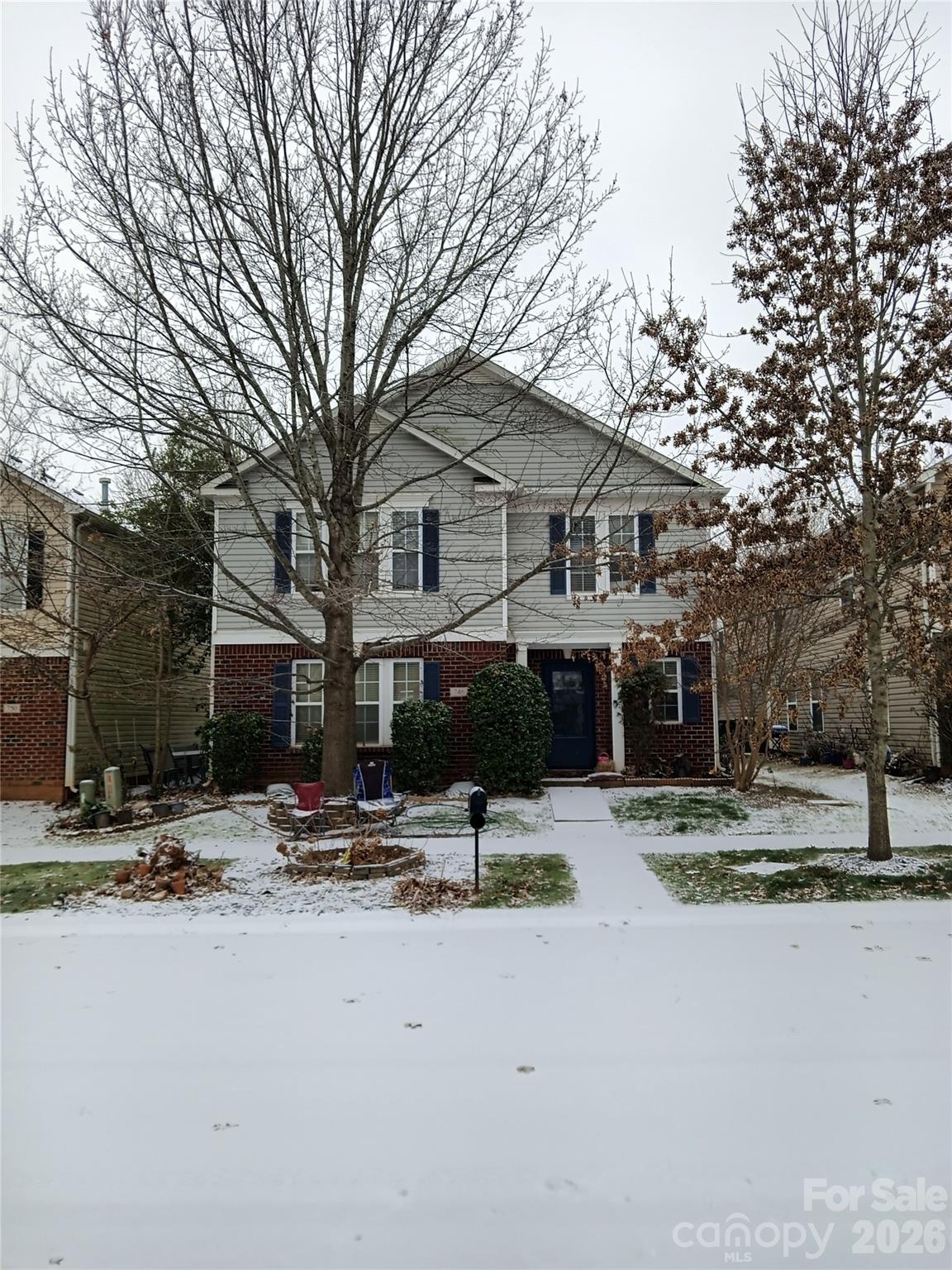 746 Sinclair Drive Monroe, NC 28112 - Photo 2 of 12 a view of the house with snow on the road
