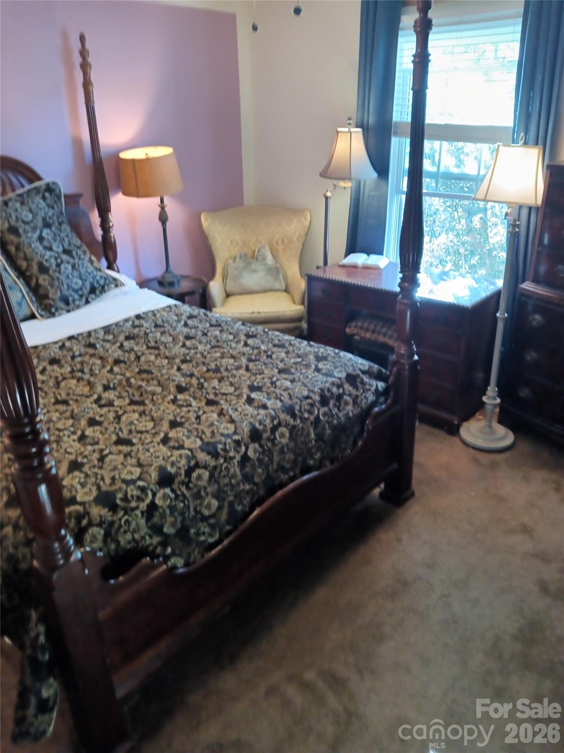 746 Sinclair Drive Monroe, NC 28112 - Photo 6 of 12 a bed sitting in a bedroom next to a window
