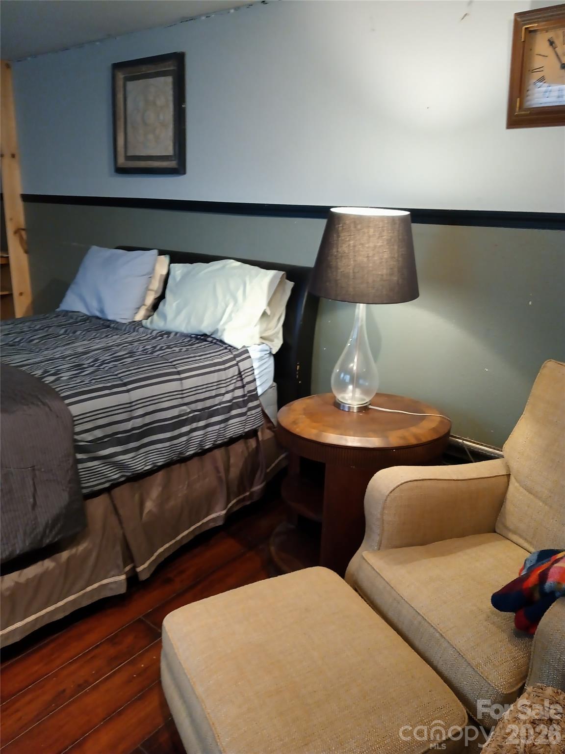 746 Sinclair Drive Monroe, NC 28112 - Photo 7 of 12 a bedroom with bed and a lamp