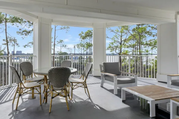 a view of a dining room with furniture window and outside view