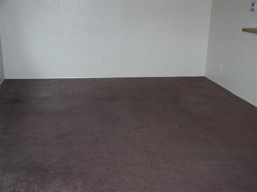 7210 Pineberry Road Dallas, TX 75249 - Photo 2 of 8 a view of wooden floor and a sink