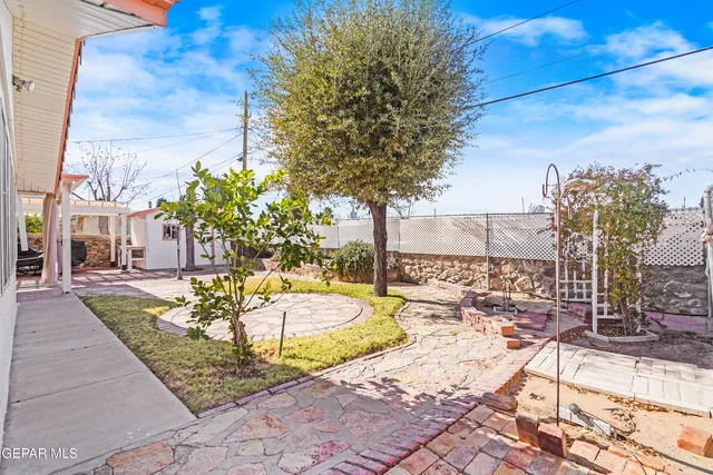 a house view with a backyard space