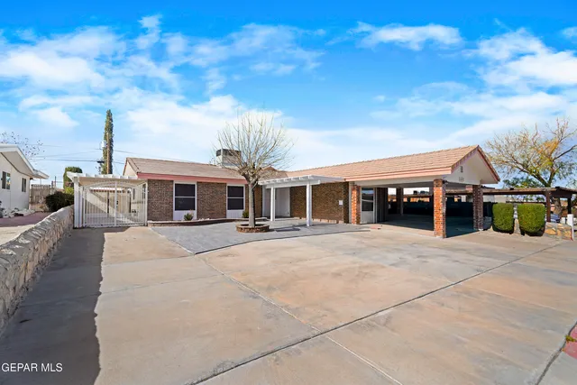 a front view of a house with a patio