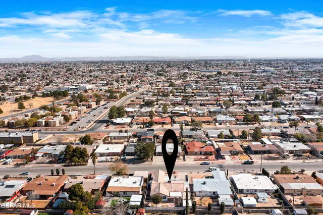 an aerial view of a city with lots of residential buildings