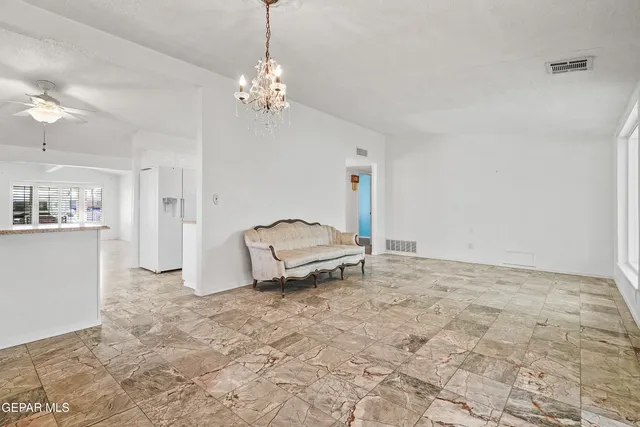 a very nice looking room with a chandelier